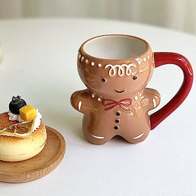 Weihnachtstag Custom 300ml Süßes Lebkuchen Mannform Kuscheltasche Keramik Kaffeetasse