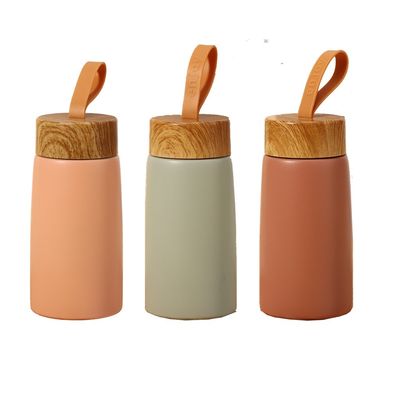 Vakuumflaschen Thermosen Kleinkapazität Isolierte Tasse mit kreativem Holzkorndesign