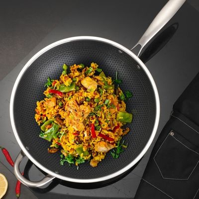 Rostbeständig 304 Edelstahl Wok mit klebstofffreier Beschichtung und Honigstockmuster