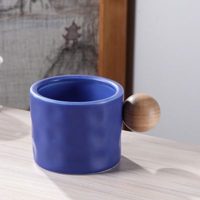 330ml Keramik Kaffeetasse mit Holzkugelgehand
