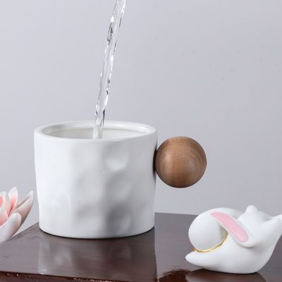 330ml Keramik Kaffeetasse mit Holzkugelgehand