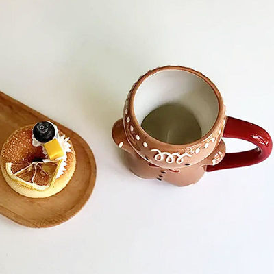 Umweltfreundliche 300 ml Weihnachts-Keramik-Milch-Tasse mit süßen 3D-Cartoon-Tee-Tasse Design